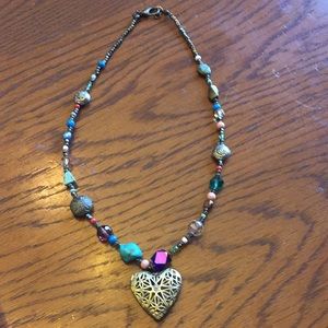 Diffuser or picture locket necklace.